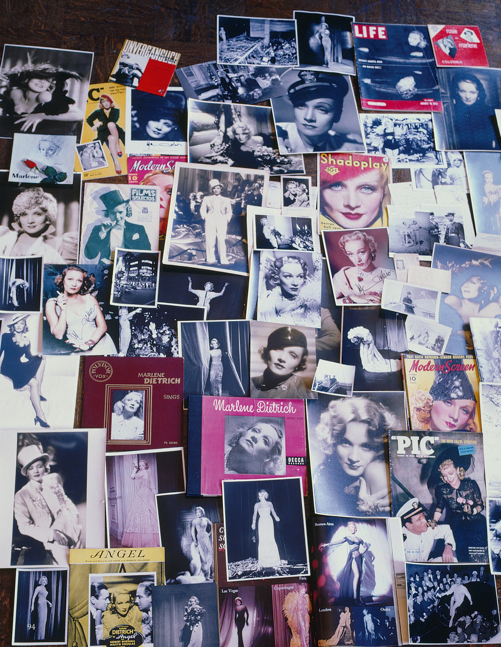 View of album covers and other ephemera displayed on a table