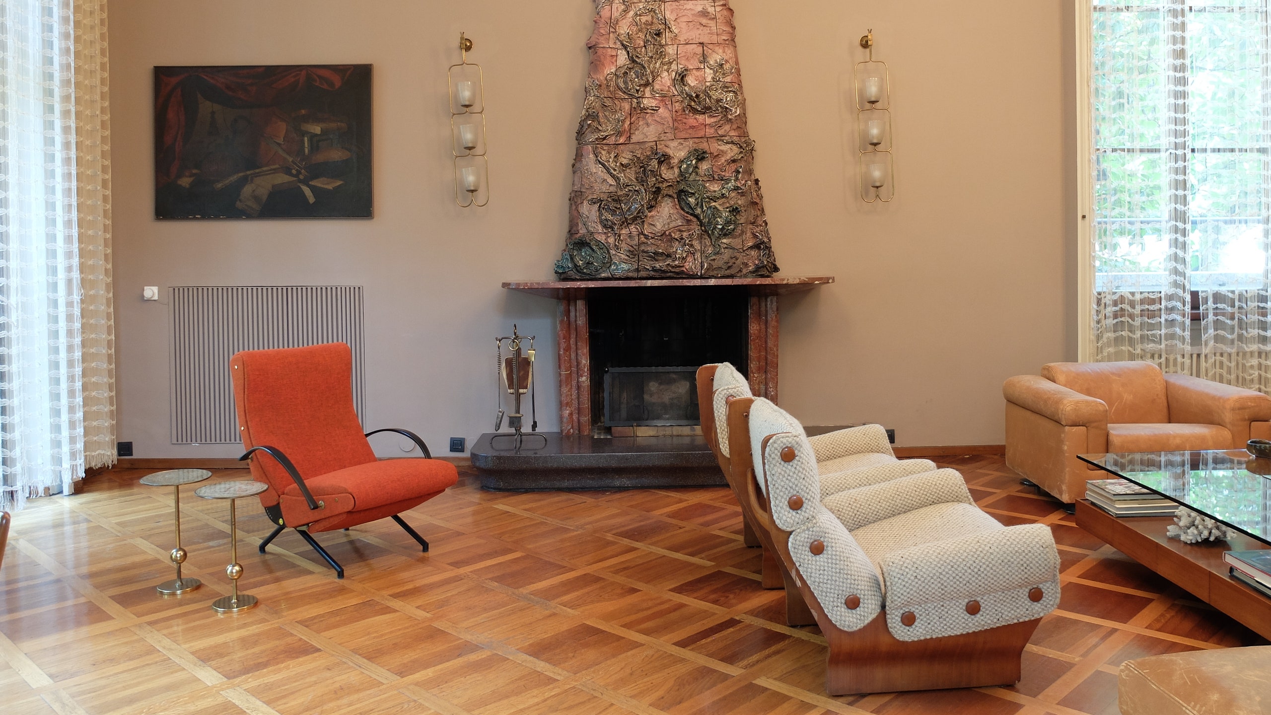Fireplace by Lucio Fontana and lighting by Guglielmo Ulrich