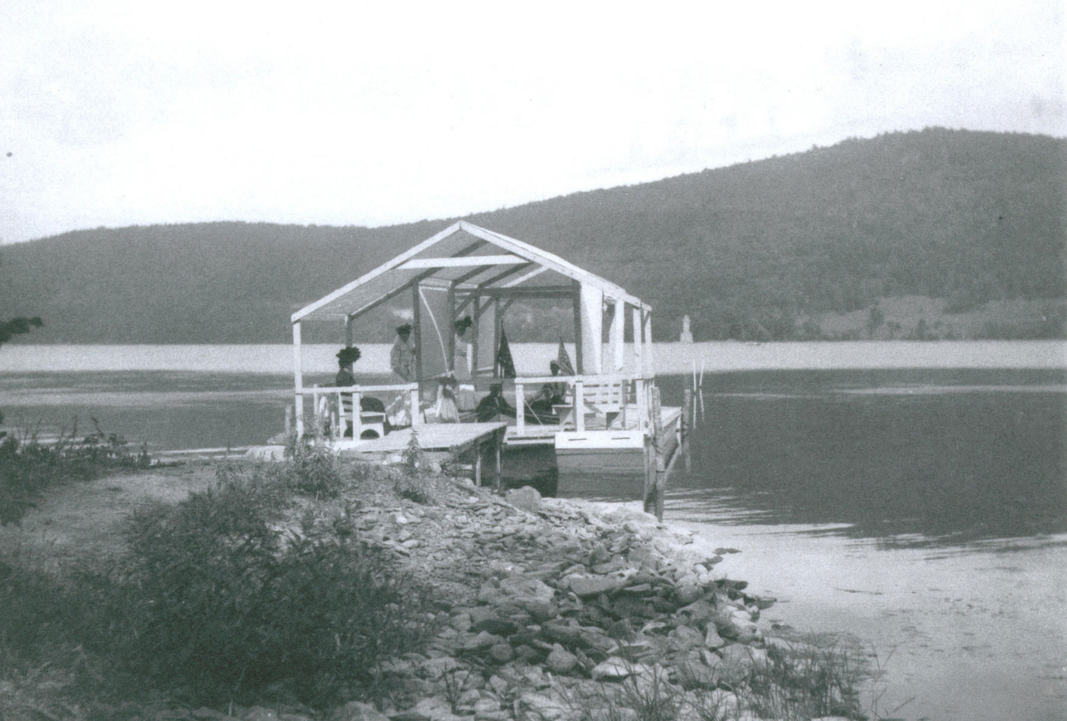 Brookwood residents and guests gather at the estates onetime dock in the early 1900s. Archive imagery courtesy Otsego...