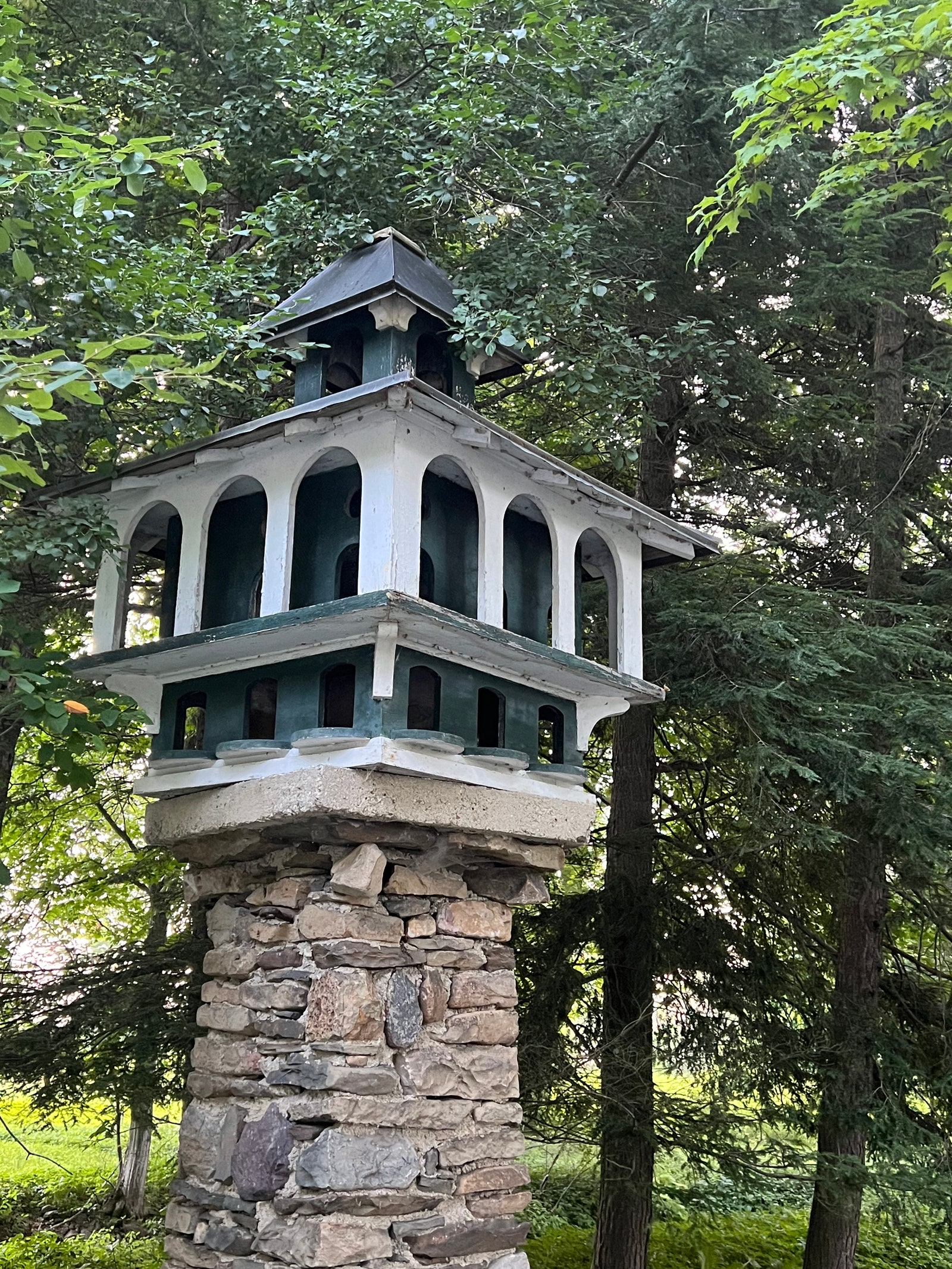 The gardens galleried birdhouse dates from the early 1900s. Photograph Mitchell Owens 2023