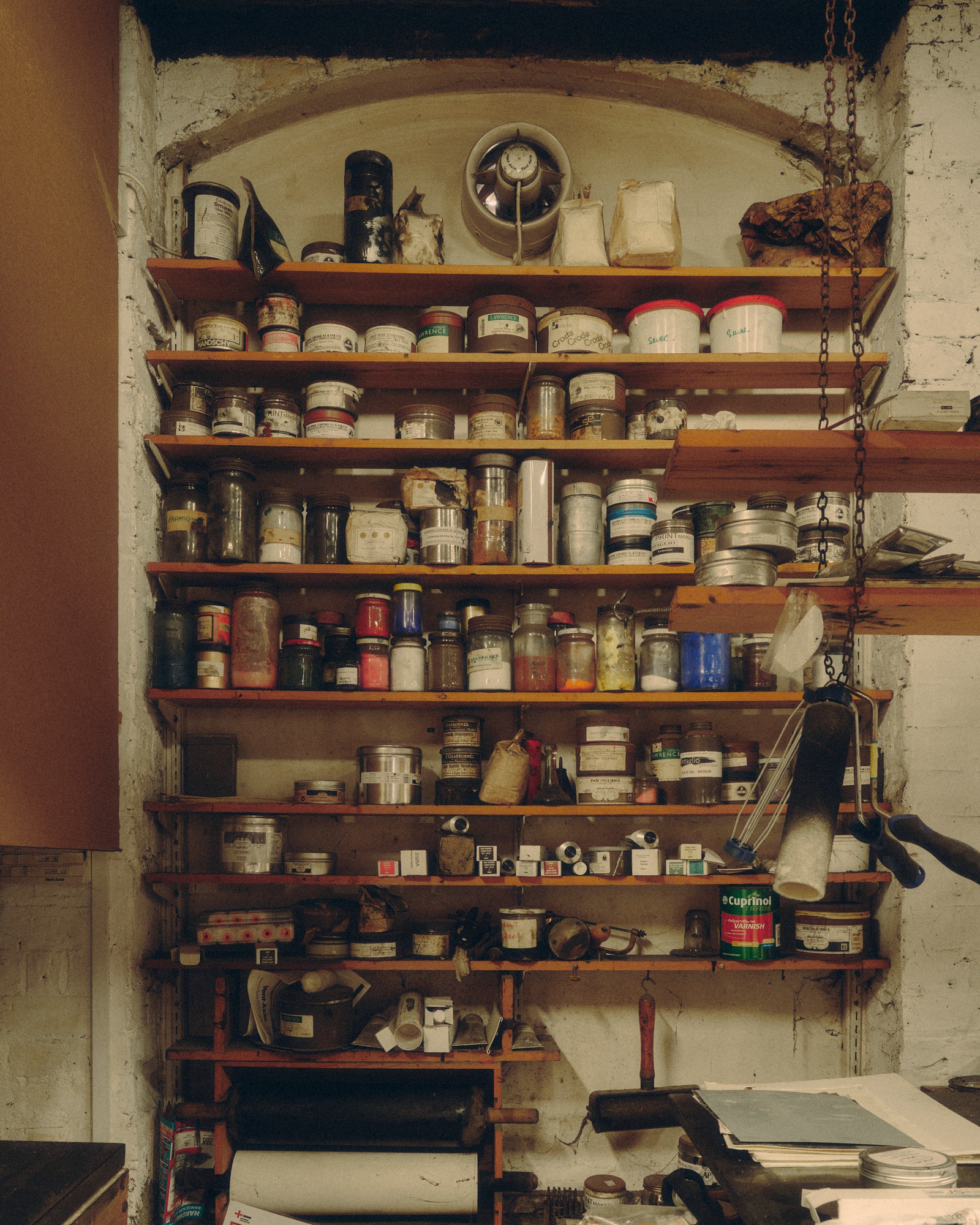 Norman Ackroyd studio. Shelf Closet Cupboard Furniture Person and Pantry